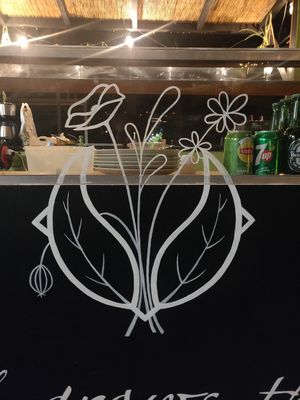 The logo on the bar at Wildflower Canteen in Leiden