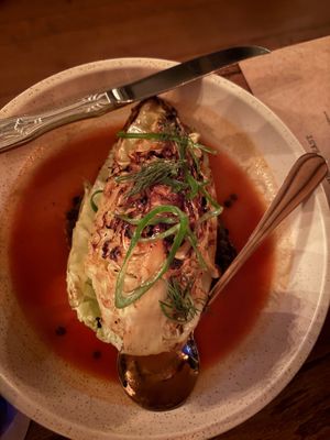 Seared Filderkraut Cabbage braised black lentils, tomato brodo at Ground Provisions in West Chester