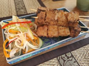 Fried tofu with papaya salad at Mekong MoJo  in Krong Kracheh