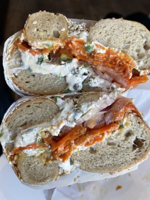 Lox on sesame bagel with scallion cream cheese  at Ben & Esther's Vegan Jewish Deli in Seattle