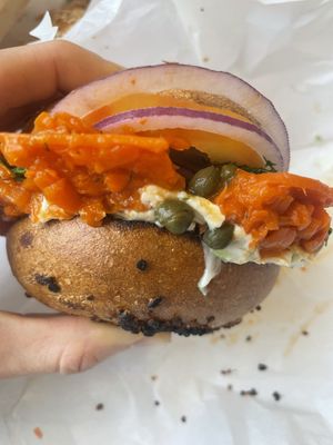 Lox on garlic bagel with scallion cream cheese  at Ben & Esther's Vegan Jewish Deli in Seattle