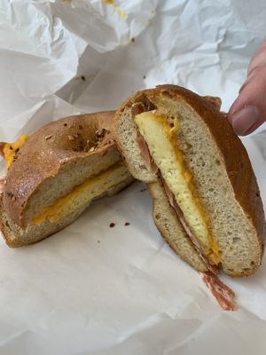 Bacon Egg & Cheese on Onion bagel 🥯   at Ben & Esther's Vegan Jewish Deli in Seattle