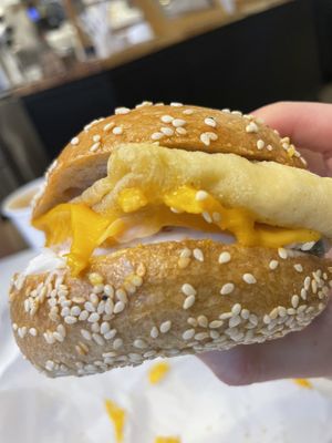 Egg & cheese (added bacon scallion shmear) on sesame bagel  at Ben & Esther's Vegan Jewish Deli in Seattle