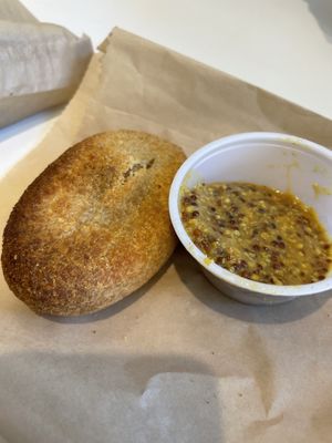 Knish with deli mustard   at Ben & Esther's Vegan Jewish Deli in Seattle
