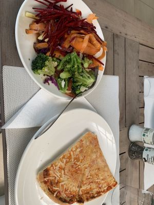 Vegan pizza and salad  at Sunrise Attitude in Flacq