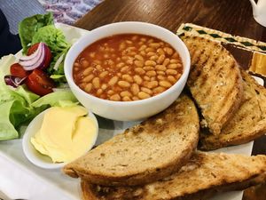 Beans on toast with vegan butter   at Barter Books in Alnwick