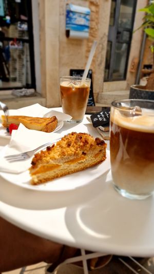 Cheescake, peach cake and two iced coffees with oat milk. All together - 22 euros. at Re.sen in Mallorca