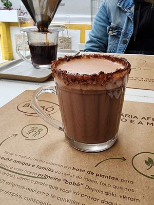 Bolo de coco molhado com calda at Bobó Empório Vegano in Sao Paulo