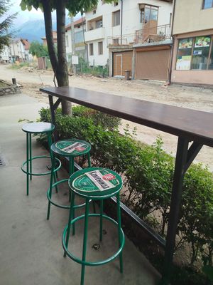 The only seats of the place at Street food bar Groshe in Bansko