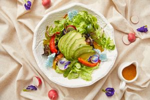 Grilled bell pepper and avocado salad with passion fruit dressing at Tonklar Facai - Mahidol Salaya in Nakhon Pathom