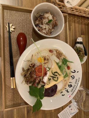 New Year’s Ramen with rice/vegan cheese addition, plus pickles in the little dish  at Uno Yukiko - Gion Soy Milk Ramen - ぎをん豆乳らーめん うのゆきこ in Kyoto