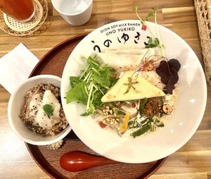 This is the soup Ramen bowl with a side dish of brown rice that you can mix a little soup with at the end. I did it and it was a great suggestion. Beautiful food.  at Uno Yukiko - Gion Soy Milk Ramen - ぎをん豆乳らーめん うのゆきこ in Kyoto