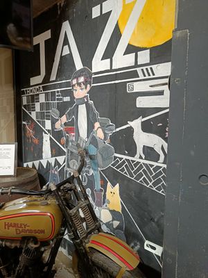 The place has very cool murals by the entrance. at Uno Yukiko - Gion Soy Milk Ramen - ぎをん豆乳らーめん うのゆきこ in Kyoto