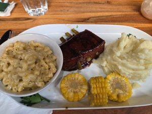 BBQ Tender Ribs, With Mash Potatoes, Mac N Cheese and Corn at NSV Creative Caribbean Kitchen in Brooklyn