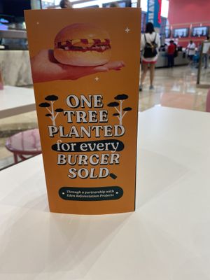 Give me 100 burgers  at Neat Burger - Dubai Mall in Dubai