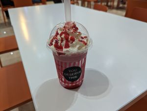 vegan strawberry milkshake with whipped cream at Neat Burger - Dubai Mall in Dubai