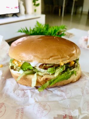 Hot chicken cheeseburger   at Neat Burger - Dubai Mall in Dubai