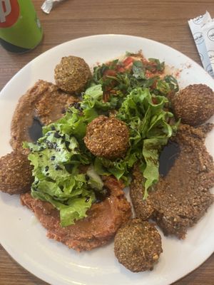 Falafel plate, with humus, bulgar wheat, tomato and bean dip and walnut dip with malasses  at Nohut Falafel Humus in Istanbul