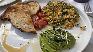 Vegan Tofu Scramble - i‘ve had better, but it‘s still very tasty. Also the bread is pretty good, so maybe try one of the numerous toast options.   at Kanéla Café  in Cape Town