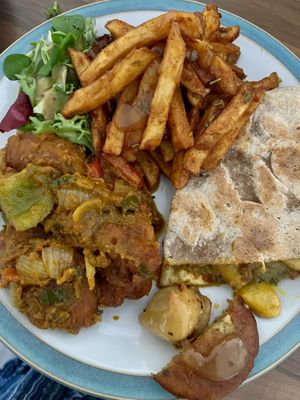 Sample of masala fries, bhagun and bean roti & cauliflower pakora khurchan   at Naany's in Bedford