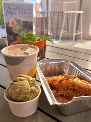 Pistachio icecream, baklava and soya iced latte 😋 at Assyrtico in Santorini