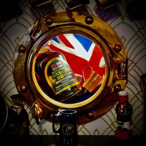 Pusser's Rum Display in the Brixham Steam Pocket Co part of the Chart Room First Class Coffee Lounge at The Chart Room in Brixham