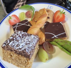 Chocolate & Coconut Flapjack, Millionaires Shortbread x2, Cheese Twist & Sausage Roll  at The Chart Room in Brixham