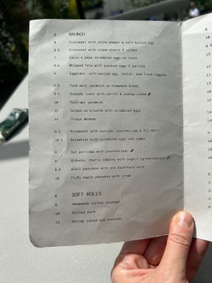 Vegan options with carrot symbol on the right  at Wagmi Coffee in Limassol