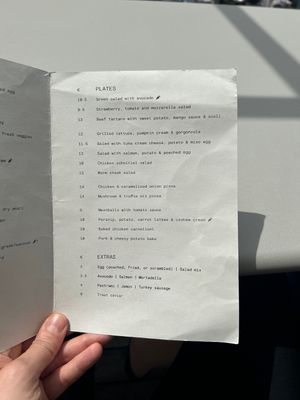 Vegan options with carrot symbol  at Wagmi Coffee in Limassol