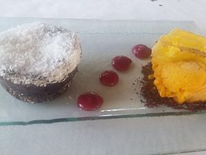 Dessert - avocado, cacao and coconut cake with passion fruit sorbet at La Atalaia del Gardoki in Sopelana