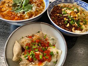 Soup with rice noodles, Dan-Dan style noodles, and Sichuan dumplings at Kaschemme in Nuremberg