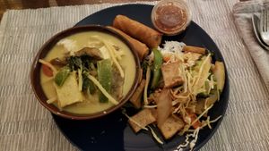 Yellow curry with tofu, spring rolls, pad ka pao at Social Thai in Ottawa