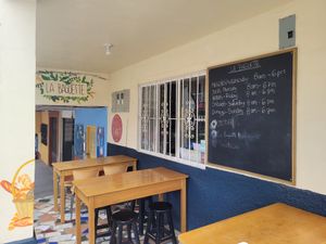 Outside sitting at La Baguette in Vilcabamba