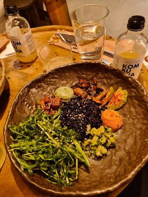 Midterrean bowl with black rice. Delicious! However, coming from the nordic cuisine, I found the vanilla pure quiet odd to this combination. at Honest Greens - Avenida in Lisbon