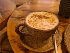 Tuneric chai latte with almond milk. at Honest Greens - Avenida in Lisbon