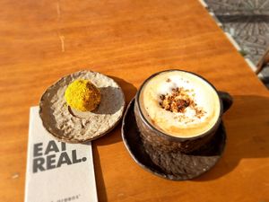 Coffee and an energy ball at Honest Greens - Avenida in Lisbon