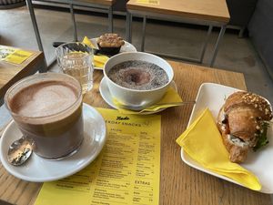 Gipfeli Sandwich, chia pudding, brownie and (oat milk) hot chocolate  at Nude Zurich in Zurich