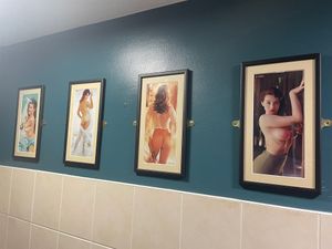 Distasteful art in the male toilet at The Barn Pub & Restaurant in Rugby