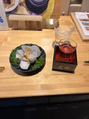 I forget what this is called. Traditional sake pour  at Vegan Izakaya NIJIYA 虹屋 in Kyoto