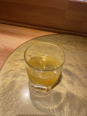 Tangerine sake  at Vegan Izakaya NIJIYA 虹屋 in Kyoto