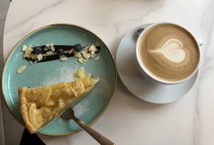 Apple cake and oat latte  at Leo's in Berlin