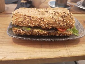Small vegan avocado and peanut butter sandwich (stacked and tasted great) at SHOTS Coffee & Brunch in Girona