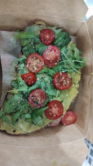 Toast with hummus and avocado to take away at SHOTS Coffee & Brunch in Girona