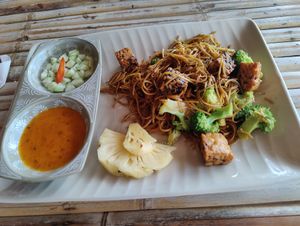 Fried noodles with tempeh and Sate sauce at SweetSoul Lanta in Krabi