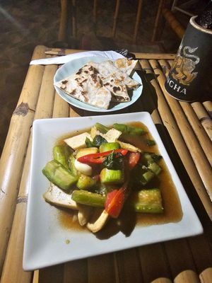 Grilled tofu with peanut sauce and homemade cucumber relish at SweetSoul Lanta in Krabi