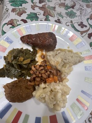 Take out with a bit of everything on the plate  at Colossal Vegan - Cloud Kitchen in Belleville