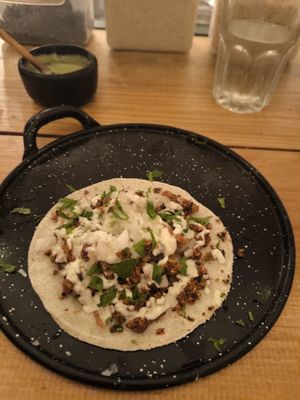 Papa con chorizo taco at Herbívora in Oaxaca