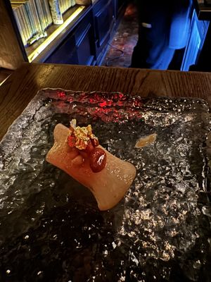 Dessert—gold leaf pear   at Omakaseed in New York City