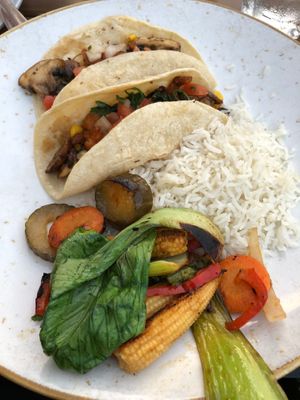 Veggie vegan tacos with coconut rice and Asian veggies at Table Mesa Bistro in Bentonville