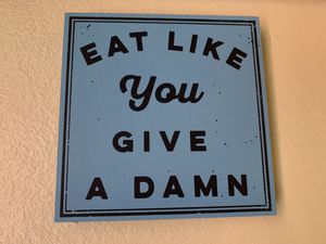 Words to live by. at Trumpet Blossom Cafe in Iowa City